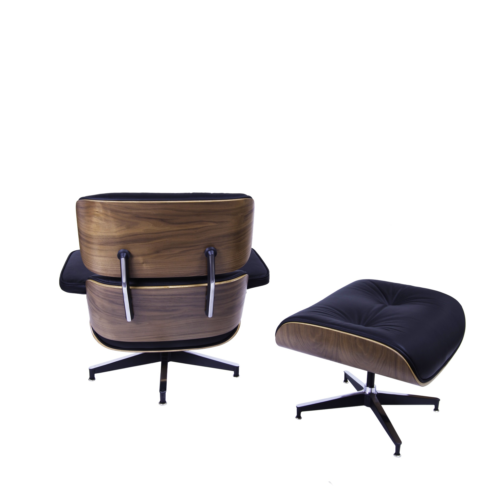 Dominidesign Lounge chair with hocker EA670 Black leather Walnut shell Black base